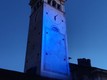 La Torre Civica illuminata di blu